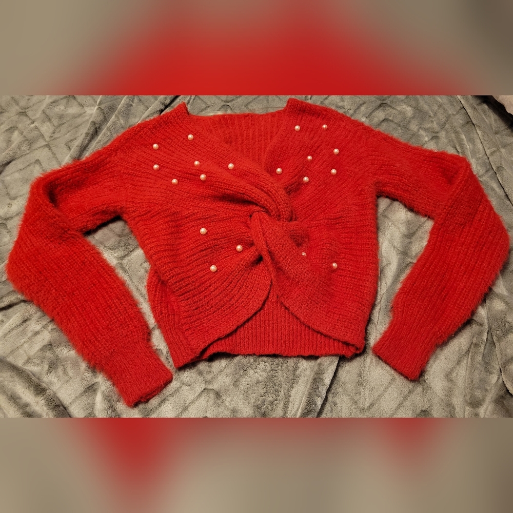 Red knitted sweater with perals